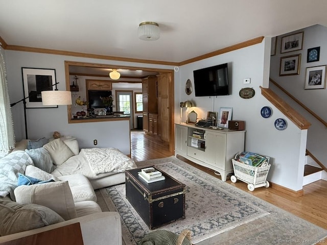 19 Hartford Ave, Old Saybrook, CT 06475 - living area featuring wood finished floors and ornamental molding