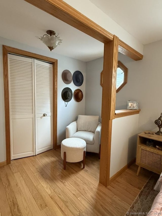19 Hartford Ave, Old Saybrook, CT 06475 - living area featuring light wood-style floors and baseboards