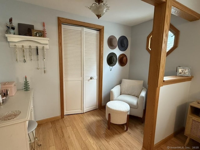19 Hartford Ave, Old Saybrook, CT 06475 - sitting room with light wood-style flooring and baseboards