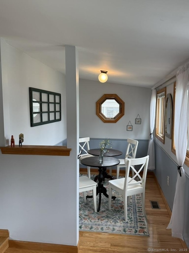 19 Hartford Ave, Old Saybrook, CT 06475 - dining area featuring healthy amount of natural light and wood finished floors