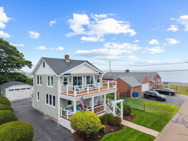 8 Fenbrook Rd, Old Saybrook, CT 06475 - view of front of property with an outdoor structure, stairway, a chimney, a deck, and a garage