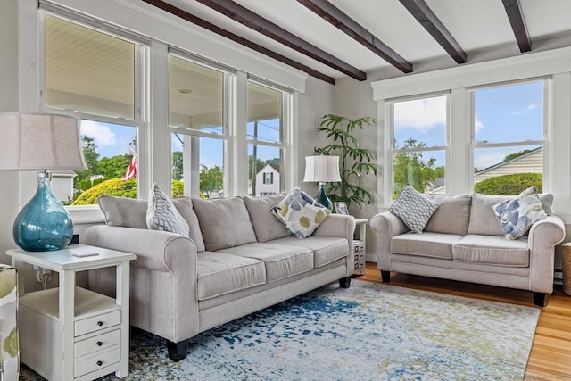 8 Fenbrook Rd, Old Saybrook, CT 06475 - living room with beamed ceiling, wood finished floors, and plenty of natural light