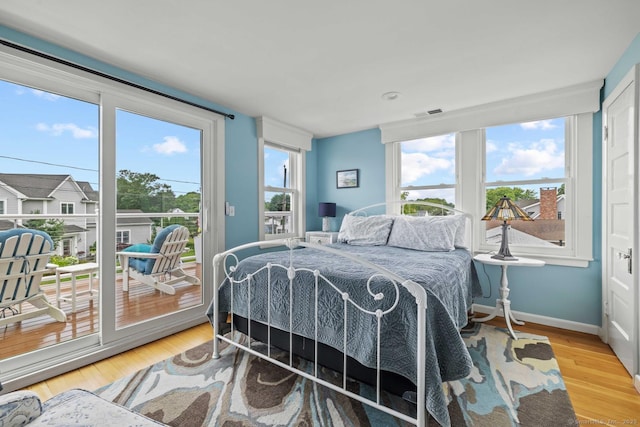8 Fenbrook Rd, Old Saybrook, CT 06475 - bedroom with access to exterior and wood finished floors