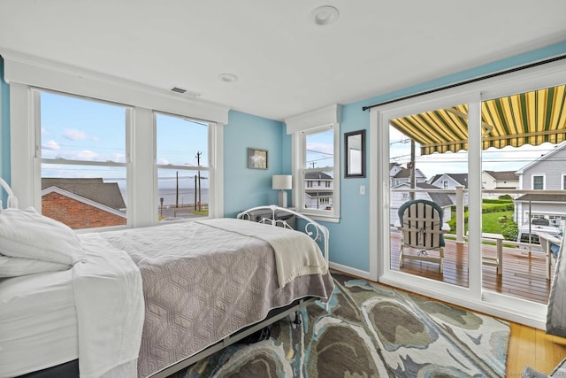 8 Fenbrook Rd, Old Saybrook, CT 06475 - bedroom with access to outside and wood finished floors