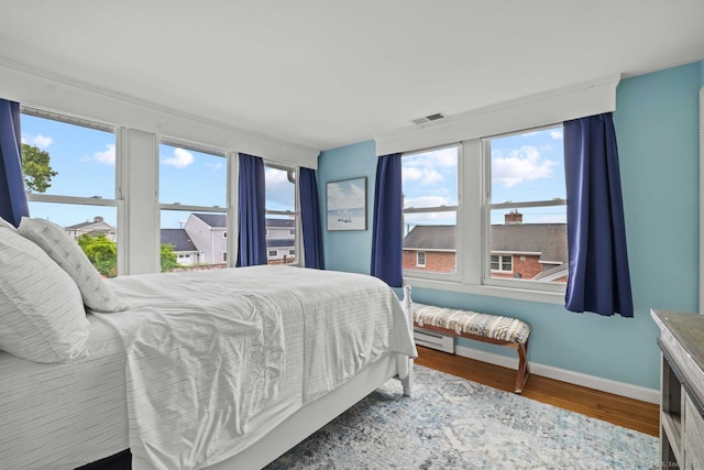 8 Fenbrook Rd, Old Saybrook, CT 06475 - bedroom with wood finished floors and baseboard heating