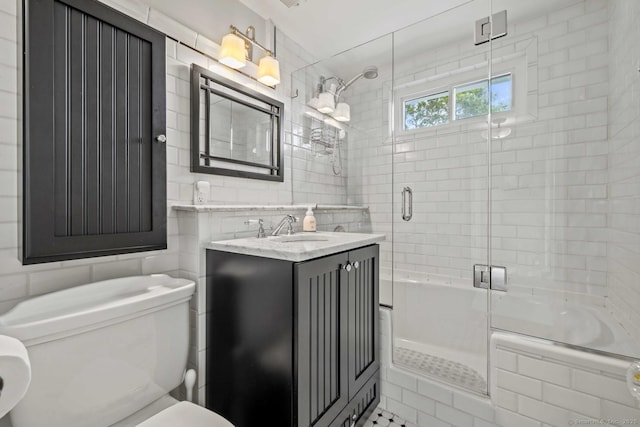8 Fenbrook Rd, Old Saybrook, CT 06475 - full bath featuring tile walls, vanity, and combined bath / shower with glass door