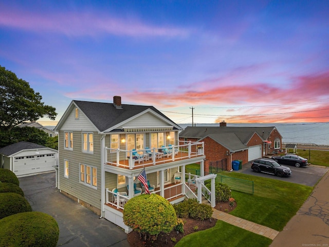 8 Fenbrook Rd, Old Saybrook, CT 06475 - view of front of property featuring an outbuilding, a detached garage, stairs, a chimney, and concrete driveway