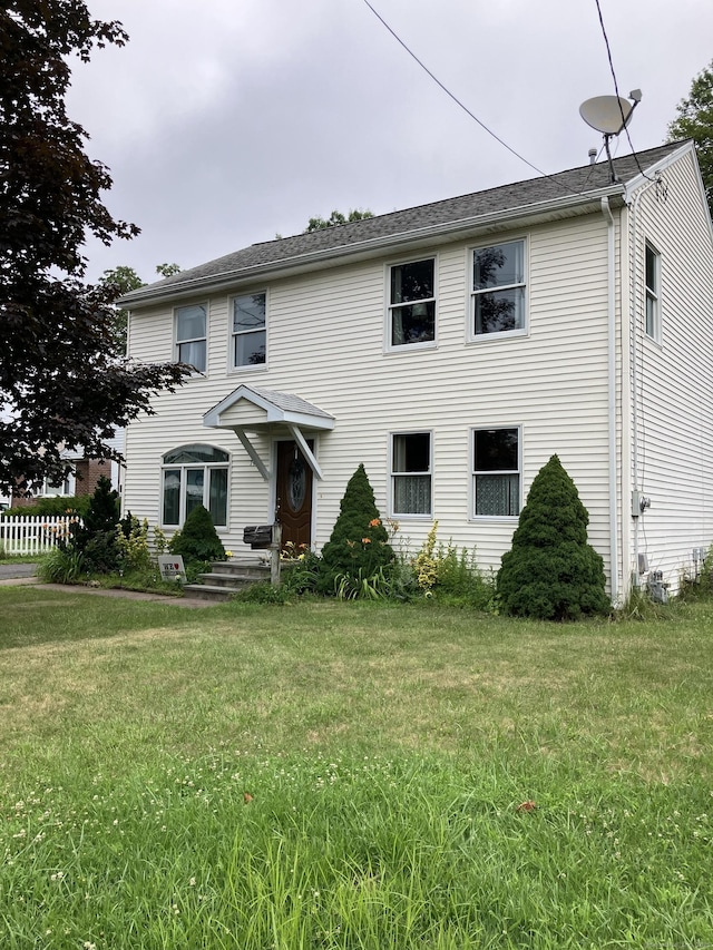 74 Brussels Ave, Wethersfield, CT 06109 - view of front of house with a front lawn
