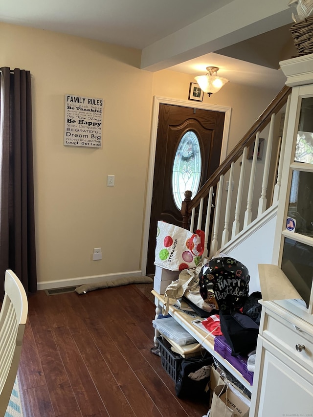 74 Brussels Ave, Wethersfield, CT 06109 - entrance foyer featuring stairway and dark wood-style flooring