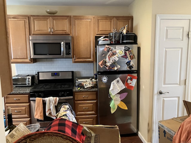 74 Brussels Ave, Wethersfield, CT 06109 - kitchen featuring appliances with stainless steel finishes and decorative backsplash