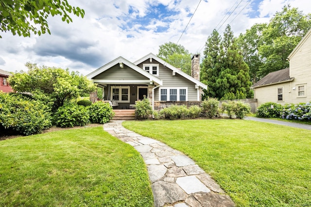 336 Main St, Wethersfield, CT 06109 - view of front facade featuring covered porch and a chimney