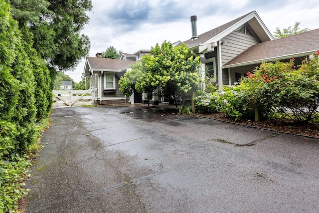 336 Main St, Wethersfield, CT 06109 - view of front of house with a gate and roof with shingles