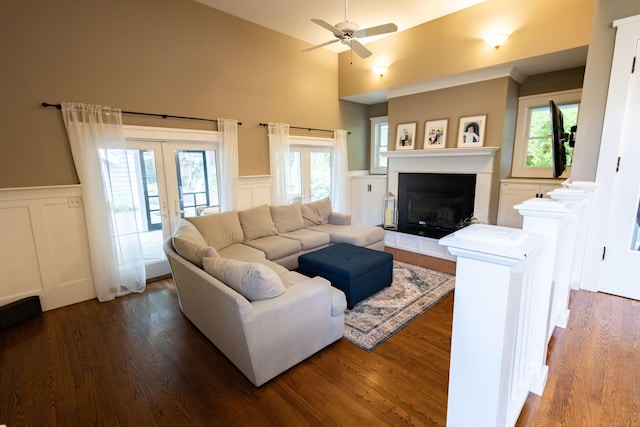 336 Main St, Wethersfield, CT 06109 - living area featuring french doors, a decorative wall, wainscoting, a ceiling fan, and wood finished floors