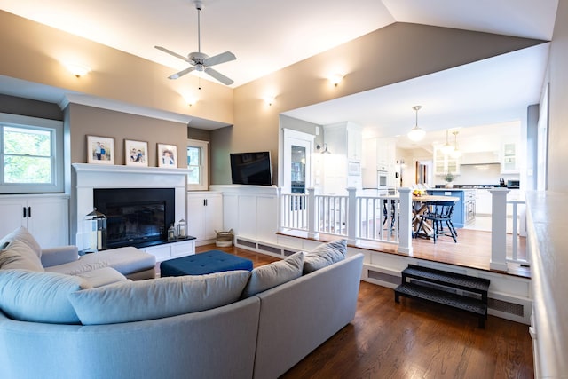 336 Main St, Wethersfield, CT 06109 - living room featuring ceiling fan, a glass covered fireplace, dark wood-style floors, and vaulted ceiling