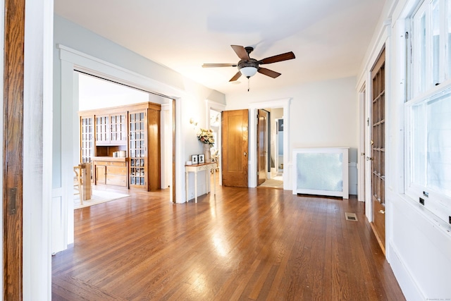 336 Main St, Wethersfield, CT 06109 - unfurnished living room with ceiling fan and wood finished floors