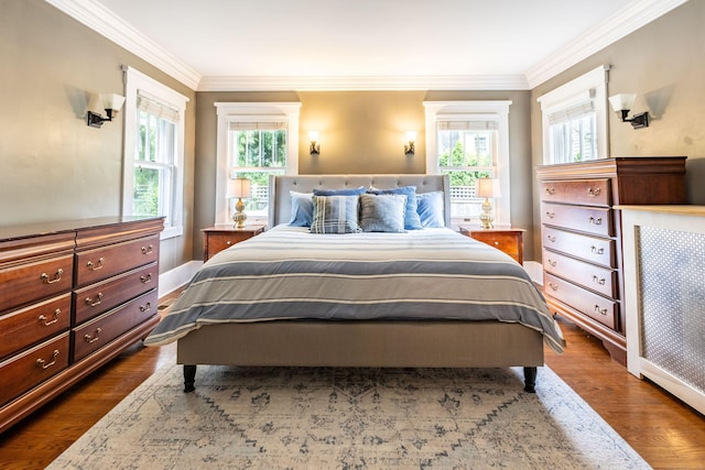 336 Main St, Wethersfield, CT 06109 - bedroom featuring crown molding and dark wood finished floors