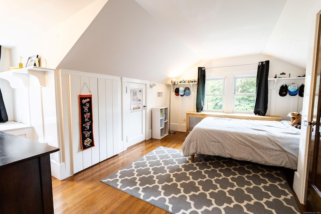 336 Main St, Wethersfield, CT 06109 - bedroom featuring vaulted ceiling and wood finished floors