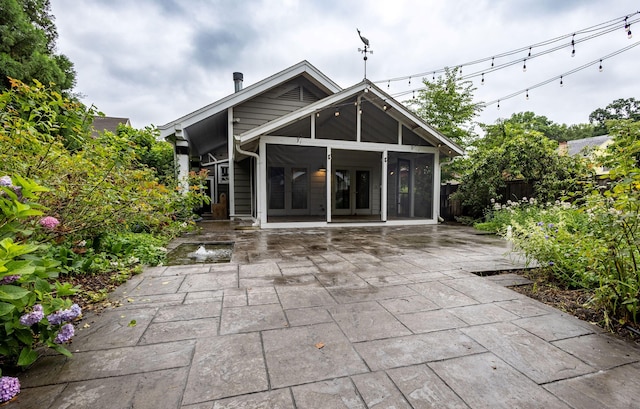 336 Main St, Wethersfield, CT 06109 - rear view of house featuring french doors and a patio