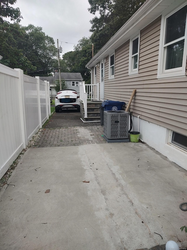 191 Dawson Ave, West Haven, CT 06516 - view of patio / terrace featuring driveway