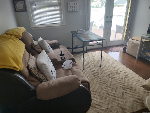 191 Dawson Ave, West Haven, CT 06516 - living area featuring wood finished floors, french doors, and a baseboard radiator