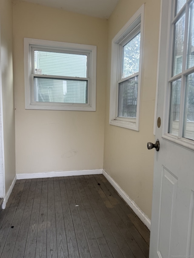 32 Lenox St, Hartford, CT 06154 - empty room featuring dark wood-style flooring and baseboards