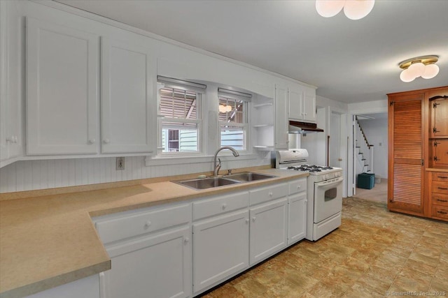 496 Mulberry St, Southington, CT 06479 - kitchen featuring white range with gas cooktop, white cabinetry, light countertops, under cabinet range hood, and open shelves