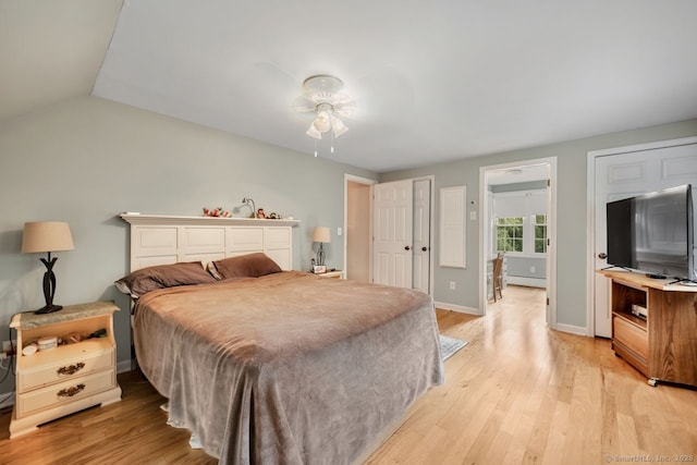 159 Woods Way Dr, Southbury, CT 06488 - bedroom featuring light wood-type flooring and baseboard heating
