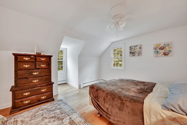 159 Woods Way Dr, Southbury, CT 06488 - bedroom with lofted ceiling, light wood-style floors, a baseboard heating unit, and a ceiling fan