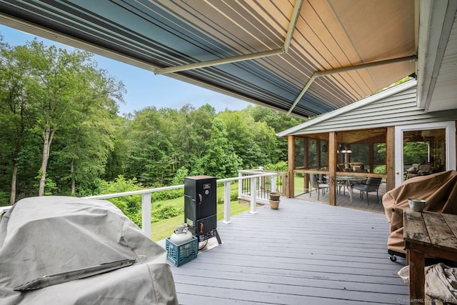 159 Woods Way Dr, Southbury, CT 06488 - wooden deck with a view of trees, a sunroom, a grill, and outdoor dining space