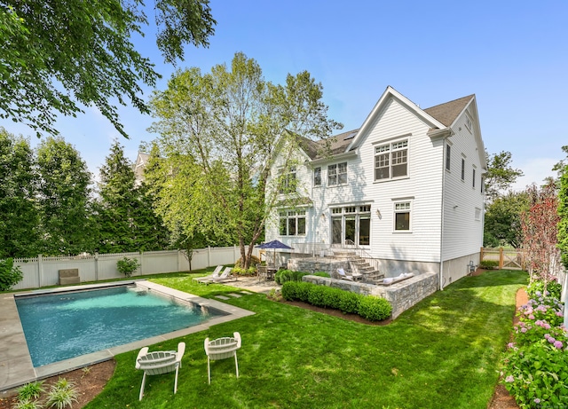 81 Birch Rd, Fairfield, CT 06824 - back of house with a fenced backyard and a patio area