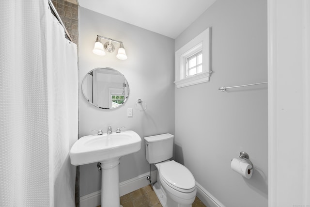 81 Birch Rd, Fairfield, CT 06824 - full bathroom with tile patterned floors and a shower with shower curtain