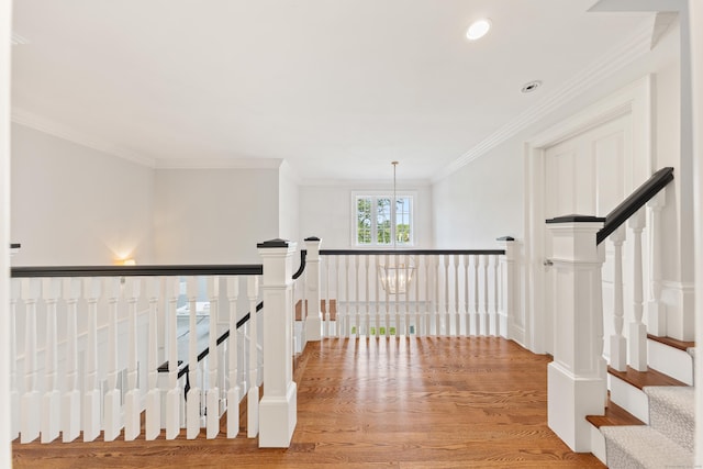 81 Birch Rd, Fairfield, CT 06824 - hall with ornamental molding, light wood-type flooring, an upstairs landing, recessed lighting, and a chandelier