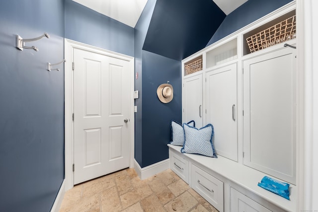 81 Birch Rd, Fairfield, CT 06824 - mudroom featuring stone tile flooring and lofted ceiling