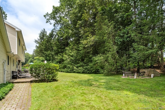 26 Philo Curtis Rd, Newtown, CT 06482 - view of green lawn featuring a wooden deck