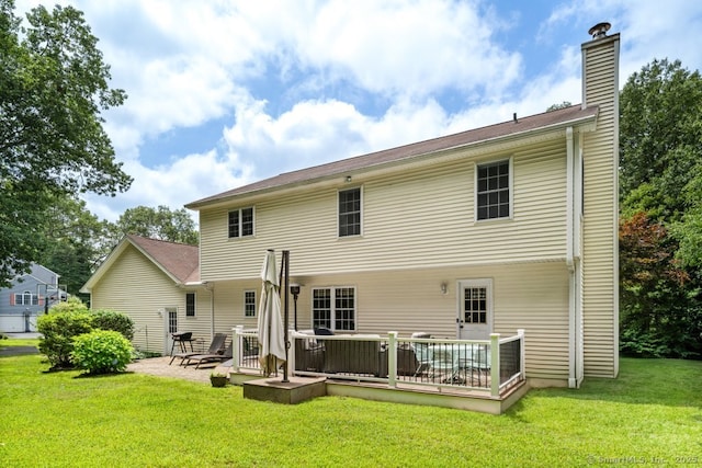 26 Philo Curtis Rd, Newtown, CT 06482 - back of house with a lawn, a wooden deck, a chimney, and a patio area