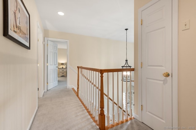 26 Philo Curtis Rd, Newtown, CT 06482 - hall with an upstairs landing, light colored carpet, and recessed lighting