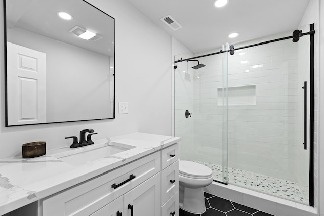 226 Ruane St, Fairfield, CT 06824 - bathroom with vanity, a shower stall, recessed lighting, and tile patterned floors