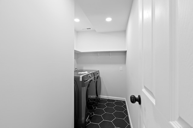 226 Ruane St, Fairfield, CT 06824 - washroom with washing machine and dryer, dark tile patterned flooring, and recessed lighting
