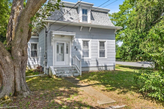 22 Benjamin St, Norwich, CT 06360 - second empire-style home featuring roof with shingles, a front yard, mansard roof, and entry steps