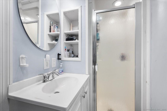 22 Benjamin St, Norwich, CT 06360 - full bath with a shower stall, vanity, and built in features