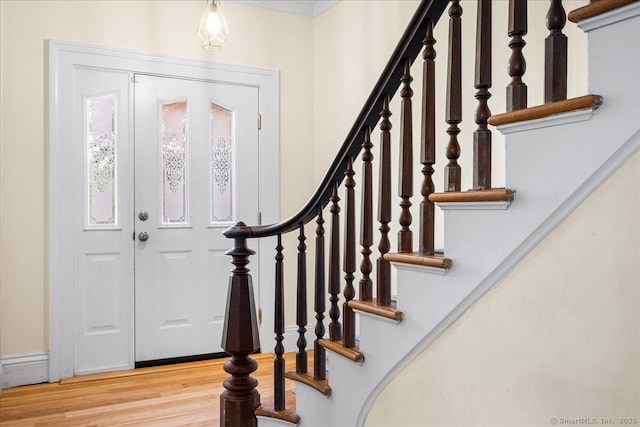 22 Benjamin St, Norwich, CT 06360 - foyer featuring wood finished floors and stairs