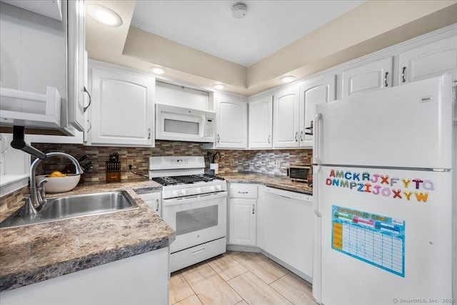 22 Benjamin St, Norwich, CT 06360 - kitchen with white appliances, white cabinetry, backsplash, and recessed lighting