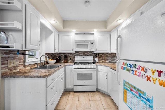 22 Benjamin St, Norwich, CT 06360 - kitchen with white appliances, white cabinetry, tasteful backsplash, and open shelves