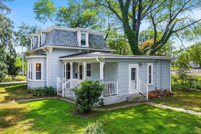 22 Benjamin St, Norwich, CT 06360 - victorian home featuring covered porch, a front lawn, mansard roof, and a shingled roof