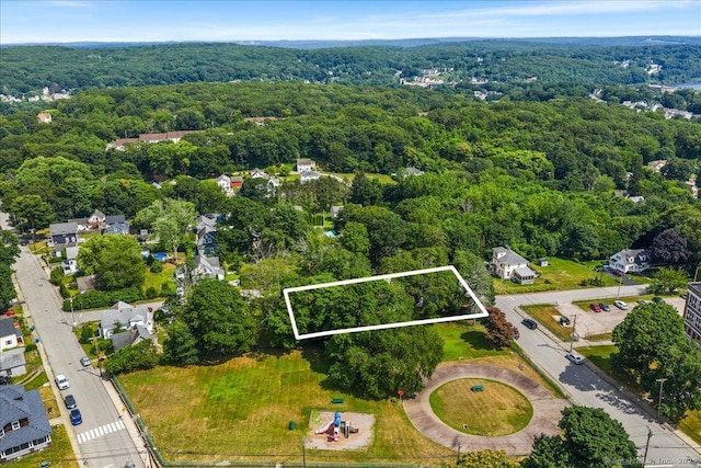 22 Benjamin St, Norwich, CT 06360 - aerial view of property and surrounding area featuring a heavily wooded area and property parcel outlined