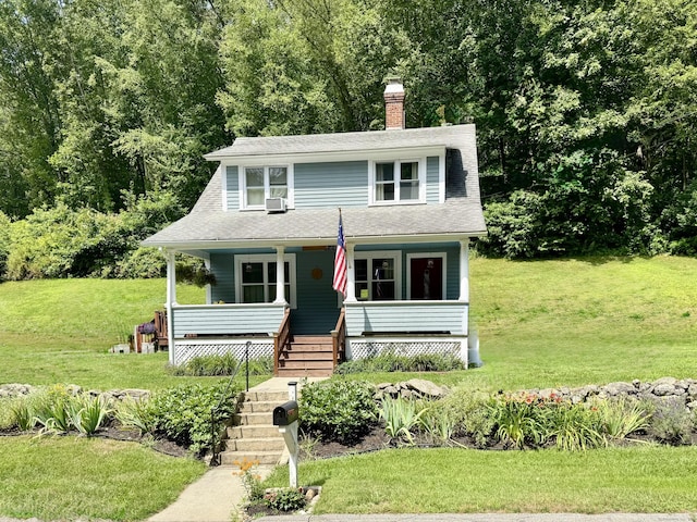 152 Bulkeley Hill Rd, Colchester, CT 06415 - view of front facade featuring covered porch, a front yard, a chimney, and a shingled roof