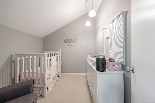 2289 Bedford St Unit F2, Stamford, CT 06905 - bedroom with lofted ceiling, light colored carpet, and a nursery area