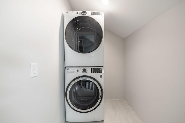 2289 Bedford St Unit F2, Stamford, CT 06905 - laundry room with stacked washer / drying machine and marble finish floors