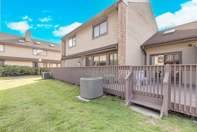 2289 Bedford St Unit F2, Stamford, CT 06905 - rear view of house with a deck and a lawn
