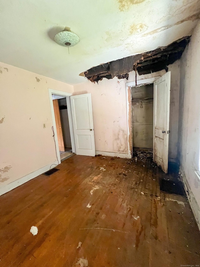 130 Wilkins Ave, Bridgeport, CT 06606 - empty room with wood-type flooring and baseboards